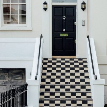 checkered steps leading to entry door