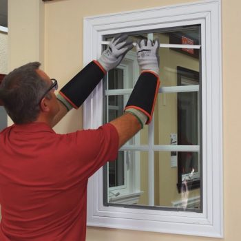 guy replaces fiberglass window
